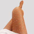 Rhinestone fishnet dance tights in coffee, worn full leg